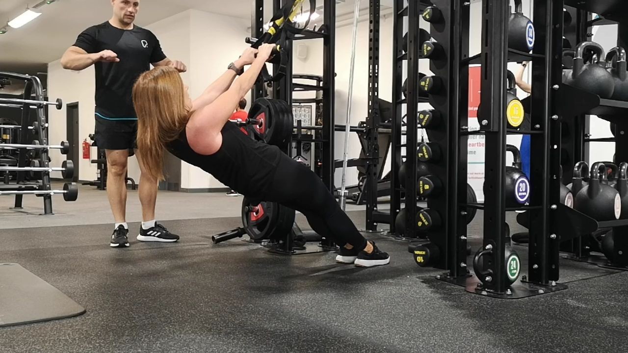 woman in black tank top and black leggings